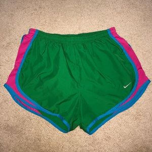 green nike shorts